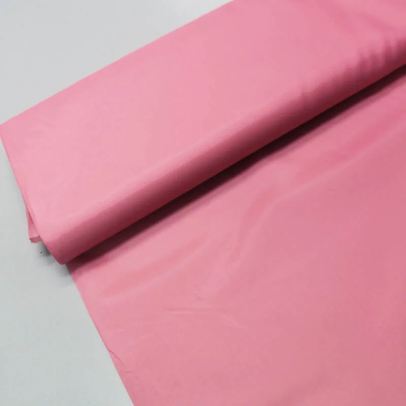 Dressmaking Anti Static Polyester Lining - Petal Pink Tunics stripes playful